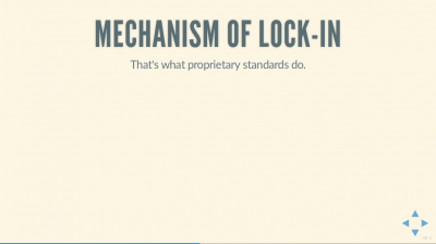 Text Slide: 'Mechanism of Lock-in: That's what proprietary standards do.'