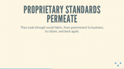 Text Slide: 'Proprietary standards permeate: They soak through social fabric, from government to business, to citizen, and back again.'